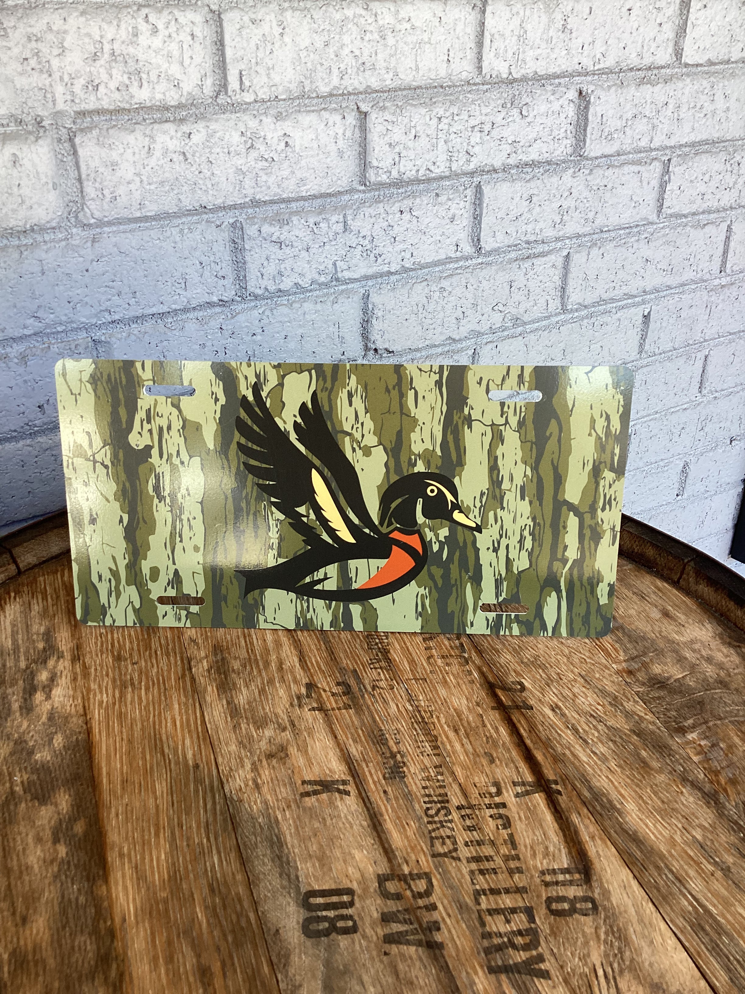 Woody Outfitters License Plate