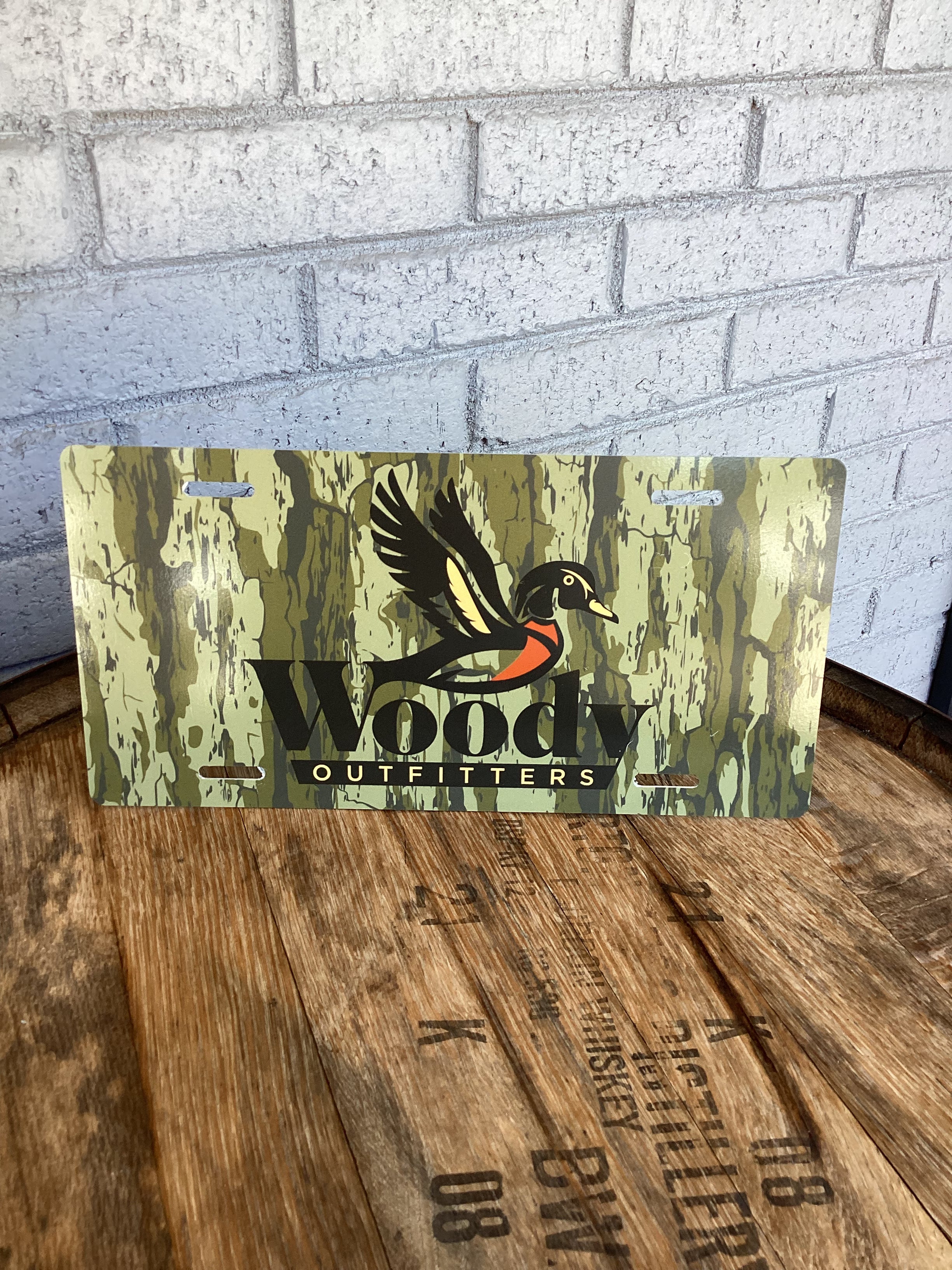 Woody Outfitters License Plate