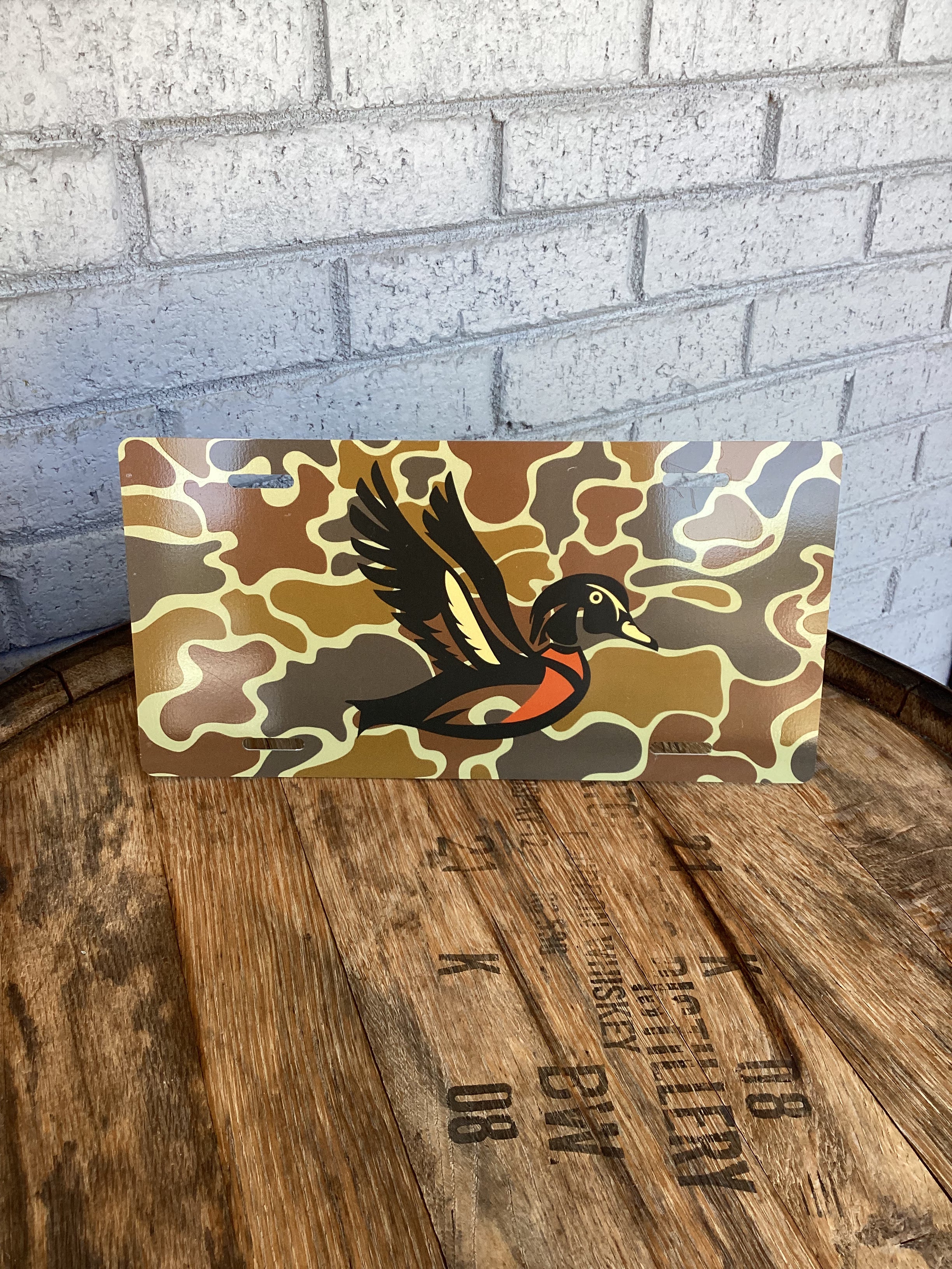 Woody Outfitters License Plate