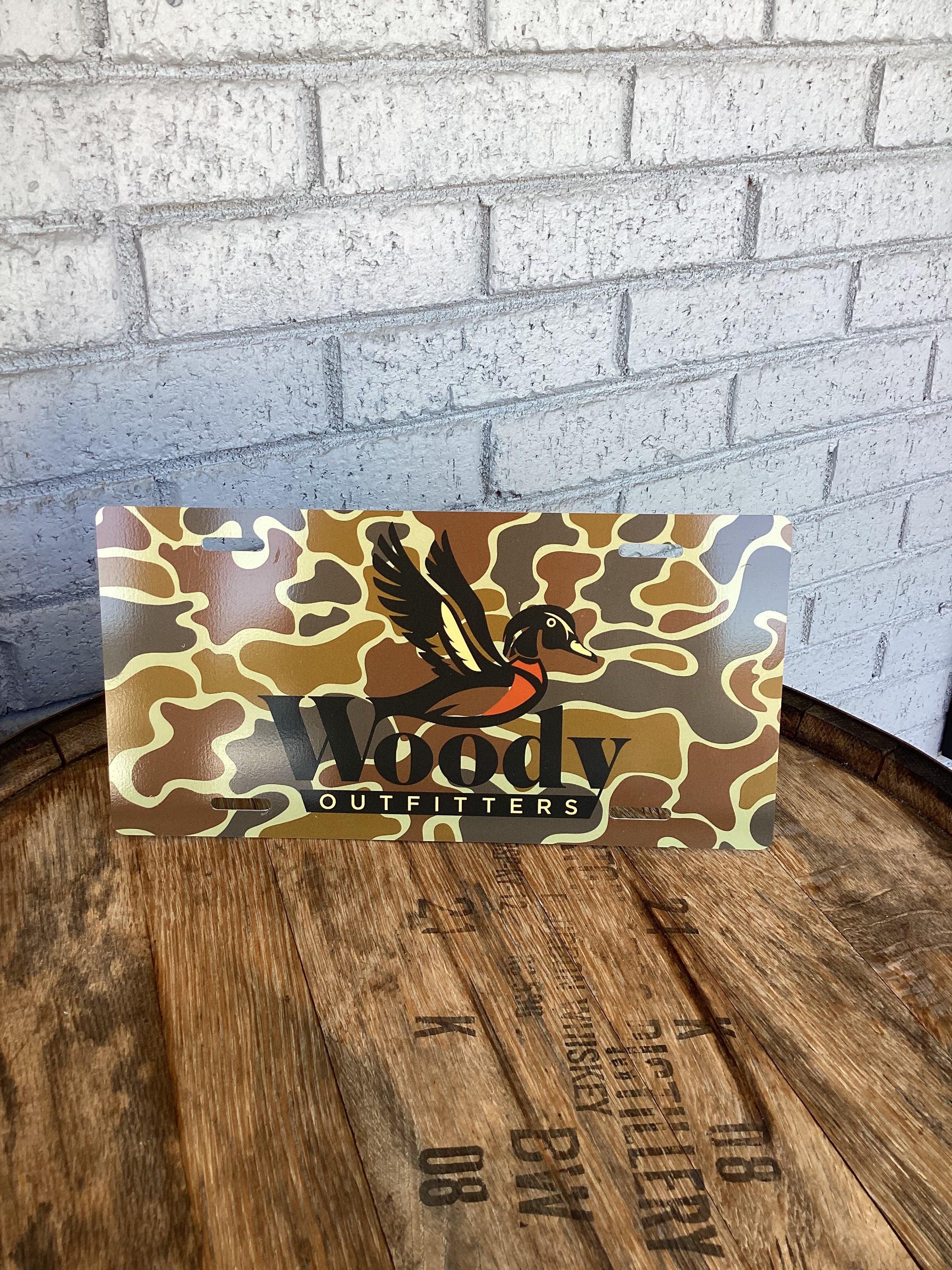 Woody Outfitters License Plate