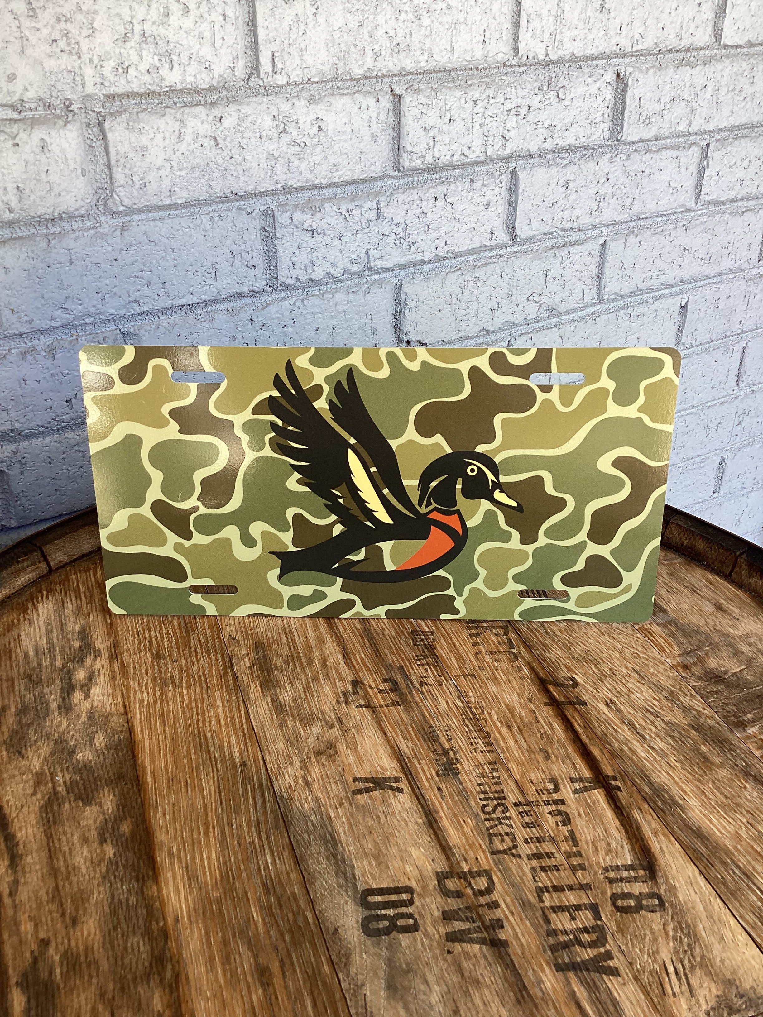 Woody Outfitters License Plate