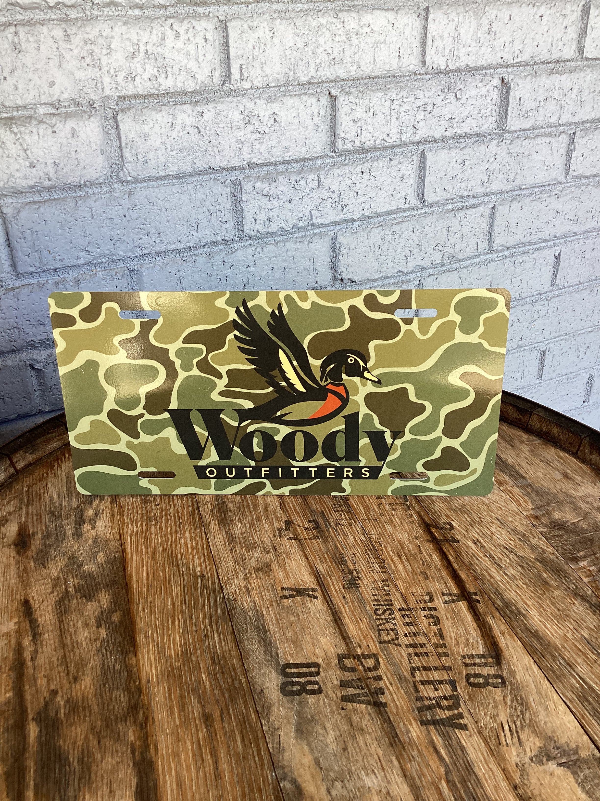 Woody Outfitters License Plate